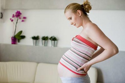 Болевые ощущения в пояснице на ранних сроках беременности