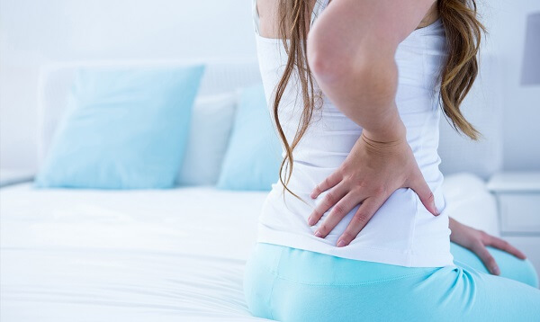 Что делать когда болит низ спины у женщины